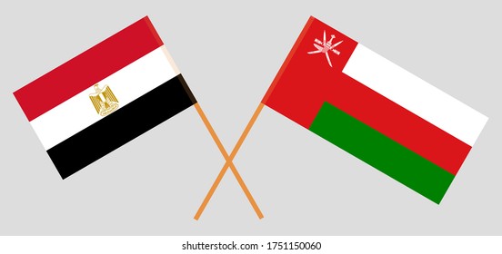 Crossed flags of Egypt and Oman. Official colors. Correct proportion. Vector illustration
