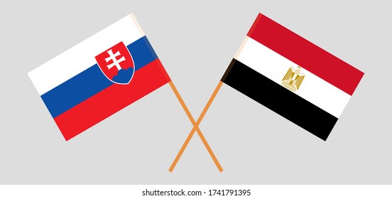 Crossed flags of Egypt and Slovakia. Official colors. Correct proportion. Vector illustration
