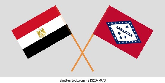 Crossed flags of Egypt and The State of Arkansas. Official colors. Correct proportion. Vector illustration
