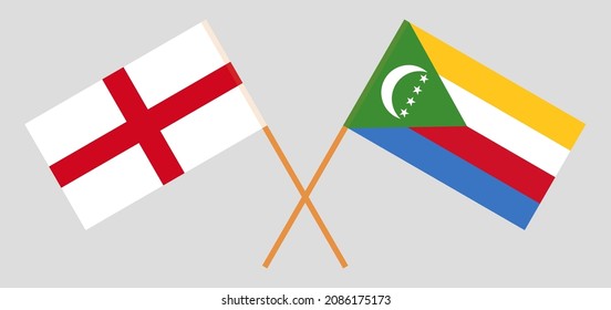 Crossed flags of England and the Comoros. Official colors. Correct proportion