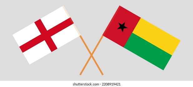 Crossed flags of England and Guinea-Bissau. Official colors. Correct proportion. Vector illustration

