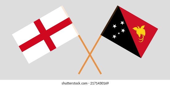 Crossed flags of England and Papua New Guinea. Official colors. Correct proportion. Vector illustration
