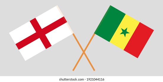 Crossed flags of England and Senegal
