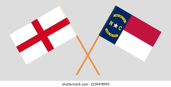Crossed flags of England and The State of North Carolina. Official colors. Correct proportion. Vector illustration
