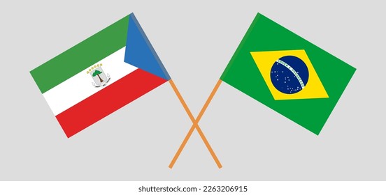 Crossed flags of Equatorial Guinea and Brazil. Official colors. Correct proportion. Vector illustration
