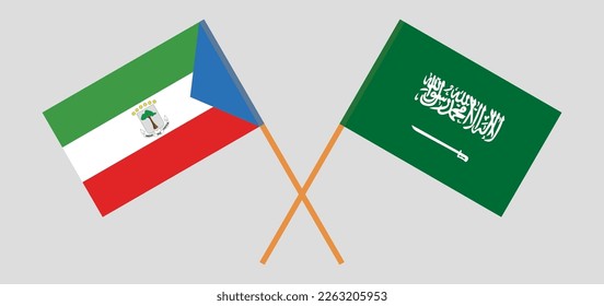 Crossed flags of Equatorial Guinea and Saudi Arabia. Official colors. Correct proportion. Vector illustration
