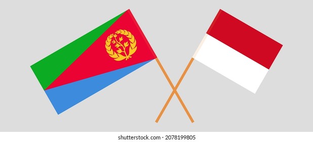 Crossed flags of Eritrea and Monaco. Official colors. Correct proportion