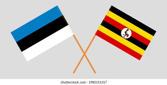 Crossed flags of Estonia and Uganda. Official colors. Correct proportion