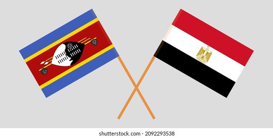 Banderas cruzadas de Eswatini y Egipto. Colores oficiales. Proporción correcta. Ilustración del vector
