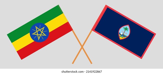 Crossed flags of Ethiopia and Guam. Official colors. Correct proportion. Vector illustration
