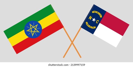 Crossed flags of Ethiopia and The State of North Carolina. Official colors. Correct proportion. Vector illustration
