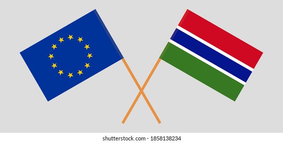 Crossed flags of the EU and the Gambia