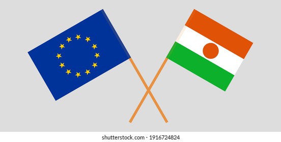 Crossed flags of the EU and the Niger