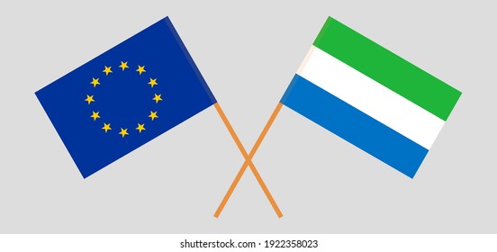 Gekreuzte Flaggen der EU und Sierra Leones. Offizielle Farben. Richtiger Anteil