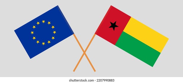 Crossed flags of the European Union and Guinea-Bissau. Official colors. Correct proportion. Vector illustration
