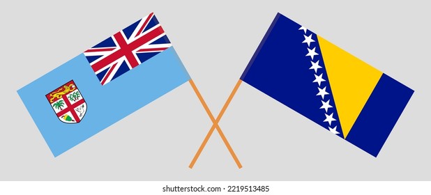 Crossed flags of Fiji and Bosnia and Herzegovina. Official colors. Correct proportion. Vector illustration
