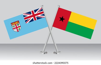 Crossed flags of Fiji and Guinea Bissau. Official colors. Correct proportion. Banner design