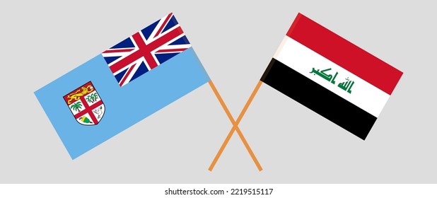Crossed flags of Fiji and Iraq. Official colors. Correct proportion. Vector illustration
