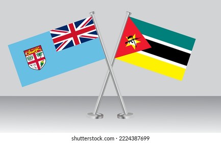 Crossed flags of Fiji and Mozambique. Official colors. Correct proportion. Banner design