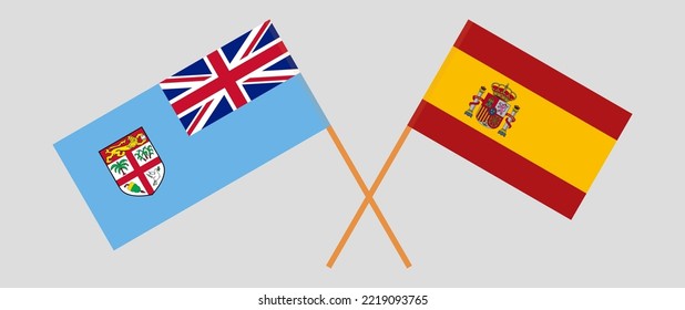 Crossed flags of Fiji and Spain. Official colors. Correct proportion. Vector illustration
