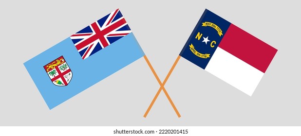 Crossed flags of Fiji and The State of North Carolina. Official colors. Correct proportion. Vector illustration
