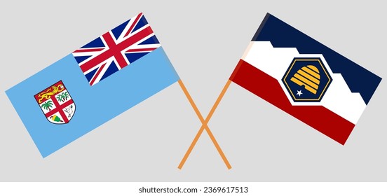 Crossed flags of Fiji and The State of Utah. Official colors. Correct proportion. Vector illustration
