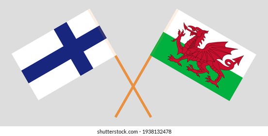 Crossed flags of Finland and Wales. Official colors. Correct proportion