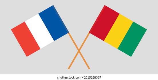 Crossed flags of France and Guinea. Official colors. Correct proportion