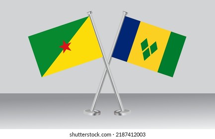 Crossed flags of French Guiana and Saint Vincent and the Grenadines. Official colors. Correct proportion. Banner design