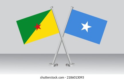 Crossed flags of French Guiana and Somalia. Official colors. Correct proportion. Banner design