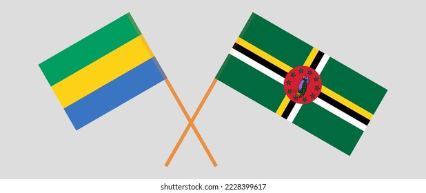 Crossed flags of Gabon and Dominica. Official colors. Correct proportion. Vector illustration
