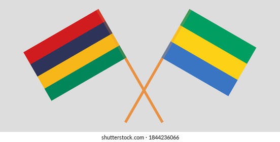Banderas cruzadas de Gabón y Mauricio