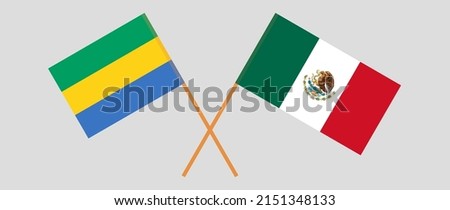 Crossed flags of Gabon and Mexico. Official colors. Correct proportion. Vector illustration
