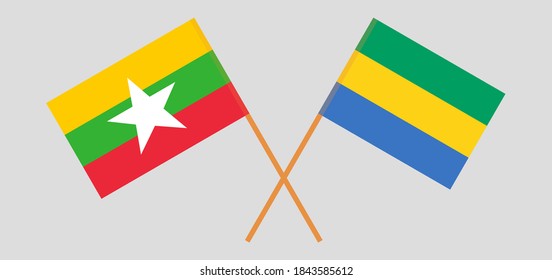Crossed flags of Gabon and Myanmar