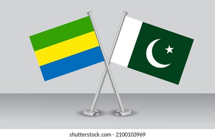 Crossed flags of Gabon and Pakistan. Official colors. Correct proportion. Banner design