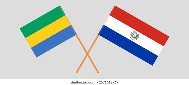 Crossed flags of Gabon and Republic of Paraguay. Official colors. Correct proportion. Vector illustration.
