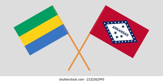 Banderas cruzadas de Gabón y El Estado de Arkansas. Colores oficiales. Proporción correcta. Ilustración del vector
