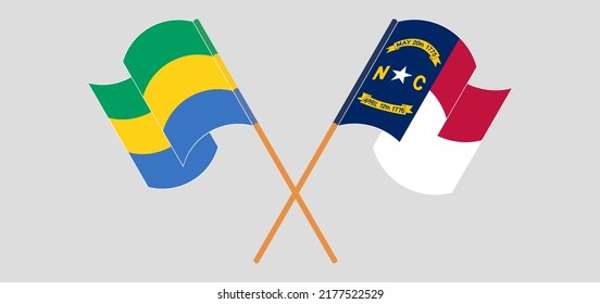 Crossed flags of Gabon and The State of North Carolina. Official colors. Correct proportion. Vector illustration
