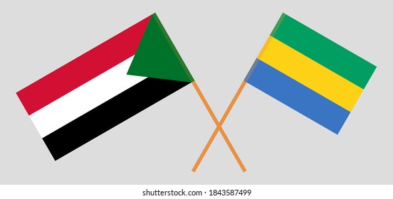 Gekreuzte Flaggen Gabuns und Sudan