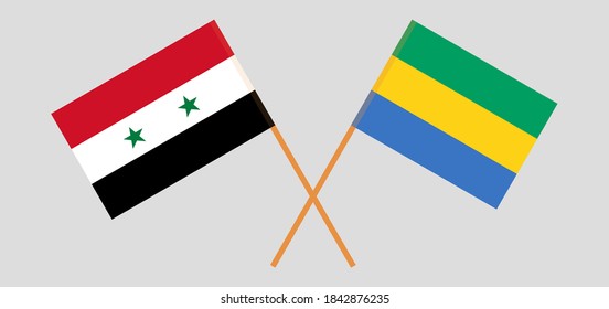 Crossed flags of Gabon and Syria