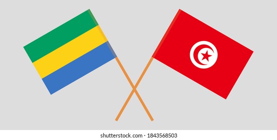 Crossed flags of Gabon and Tunisia