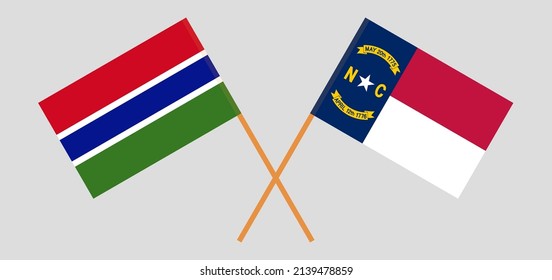 Banderas cruzadas de Gambia y el estado de Carolina del Norte. Colores oficiales. Proporción correcta. Ilustración del vector
