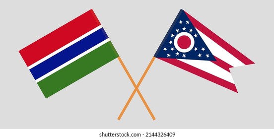 Crossed flags of the Gambia and the State of Ohio. Official colors. Correct proportion. Vector illustration
