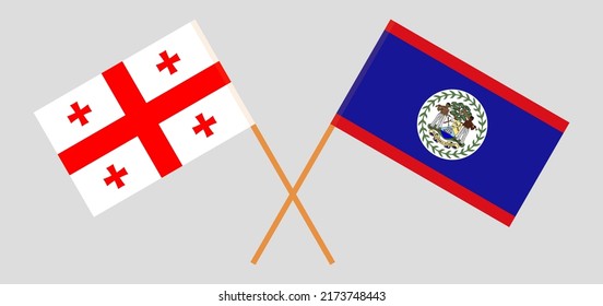 Crossed flags of Georgia and Belize. Official colors. Correct proportion. Vector illustration
