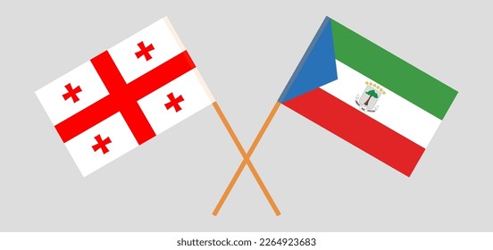 Crossed flags of Georgia and Equatorial Guinea. Official colors. Correct proportion. Vector illustration
