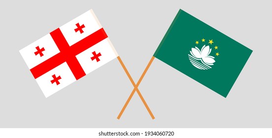 Banderas cruzadas de Georgia y Macao. Colores oficiales. Proporción correcta