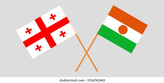 Banderas cruzadas de Georgia y Níger