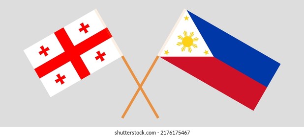 Crossed flags of Georgia and the Philippines. Official colors. Correct proportion. Vector illustration
