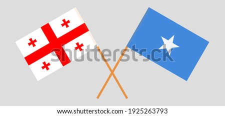 Crossed flags of Georgia and Somalia. Official colors. Correct proportion