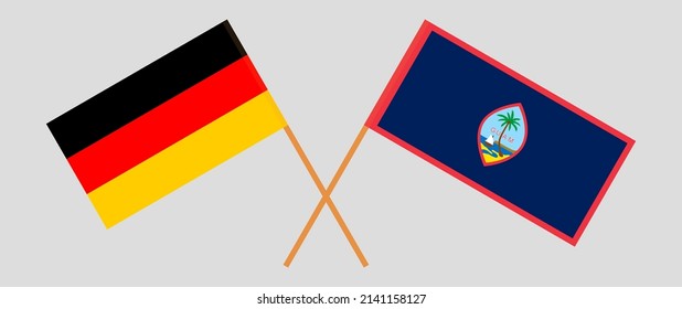 Crossed flags of Germany and Guam. Official colors. Correct proportion. Vector illustration
